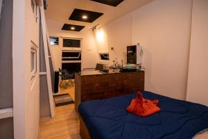 Letto o letti in una camera di Twist, Tiny home on the Cliff