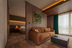 Voodi või voodid majutusasutuse Emerald Hotel toas