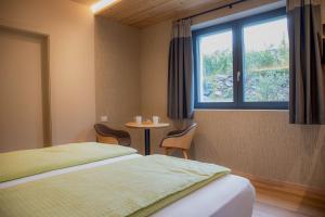 Postel nebo postele na pokoji v ubytování Balibà Ride & Relax