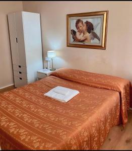 Postel nebo postele na pokoji v ubytování Hotel Dali