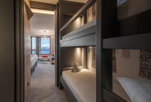 Postel nebo postele na pokoji v ubytování Altezza - Arc 1800 Hotel & Spa - ex Mercure