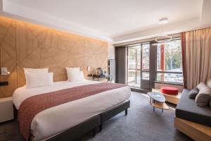 Postel nebo postele na pokoji v ubytování Altezza - Arc 1800 Hotel & Spa - ex Mercure