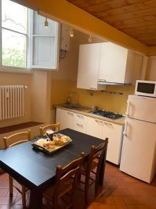 Kuchyň nebo kuchyňský kout v ubytování Hotel Dali