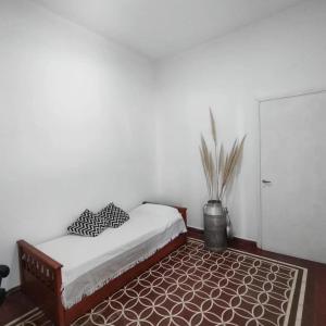 Tempat tidur dalam kamar di CASA PARA 4 PERSONAS, con asador y cochera