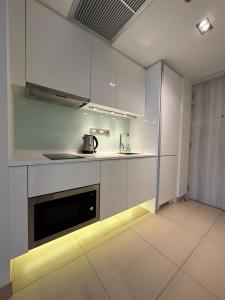 Kuchyň nebo kuchyňský kout v ubytování Sands Condominium Pattaya