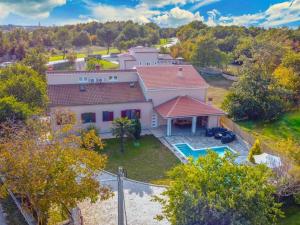 an aerial view of a house with a yard at House Antonia by IstriaLux in Svetvinčenat