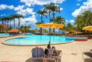 Piscina di Studio Tropical avec vue mer dans une résidence hôtelière o nelle vicinanze
