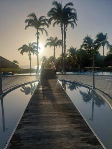 Piscina di Studio Tropical avec vue mer dans une résidence hôtelière o nelle vicinanze