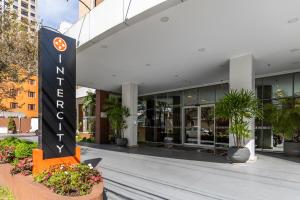 a hotel sign in front of a building at Intercity São Paulo Nações Unidas in São Paulo