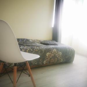 Ένα ή περισσότερα κρεβάτια σε δωμάτιο στο Rooms in Vilnius