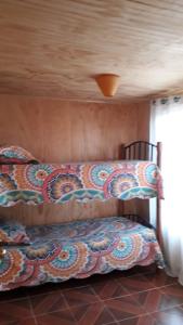 Postel nebo postele na pokoji v ubytování Cabaña ecológica