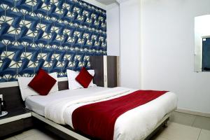 Кровать или кровати в номере Hotel Satluj