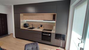 Η κουζίνα ή μικρή κουζίνα στο Apartment Joerg Sibiu