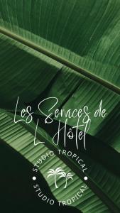 Certificato, attestato, insegna o altro documento esposto da Studio Tropical avec vue mer dans une résidence hôtelière