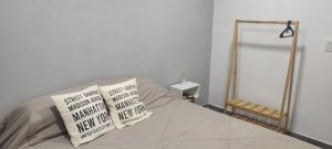 Ένα ή περισσότερα κρεβάτια σε δωμάτιο στο Nuestra Casa en Paso +22 φωτογραφίες