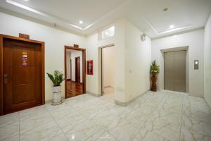 Postel nebo postele na pokoji v ubytování E&V Apartment