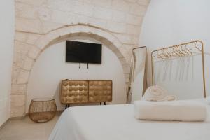 Postel nebo postele na pokoji v ubytování al 22 Suite & Spa Luxury Experience + 37 fotografií