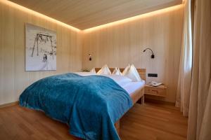 Posteľ alebo postele v izbe v ubytovaní Hotel Mohnenfluh