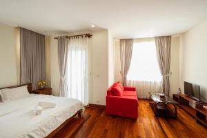 TV a/nebo společenská místnost v ubytování E&V Apartment