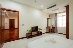 Postel nebo postele na pokoji v ubytování E&V Apartment