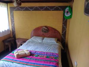 Postel nebo postele na pokoji v ubytování Salkantay Hostel Chaullay