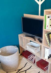 TV a/nebo společenská místnost v ubytování Studio71 + 9 fotografií