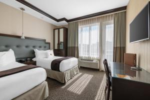 Postel nebo postele na pokoji v ubytování Aura Hotel Brooklyn