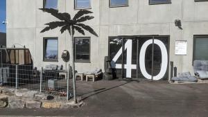 a building with the number in front of it at Business-Motel, Night-Checkin, Breakfast 2go, XL-Parking, free WiFi in Heimsheim