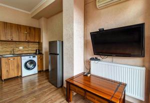 Kuchyň nebo kuchyňský kout v ubytování Comodo Apartment