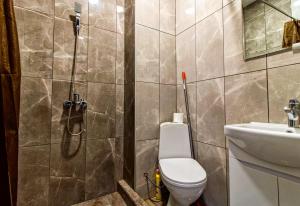 Koupelna v ubytování Comodo Apartment