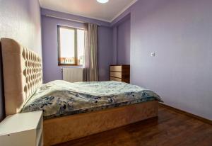 Postel nebo postele na pokoji v ubytování Comodo Apartment