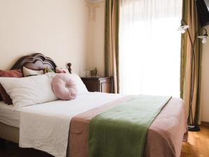 Un pat sau paturi într-o cameră la Špacapanova hiša