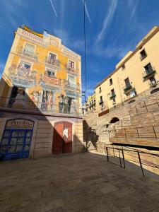 a building with a mural on the side of it at Sweet Sedassos in Tarragona