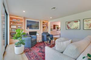 a living room with a couch and chairs and a table at Modern Austin Home with Yard about 1 Mi from ACL! in Austin