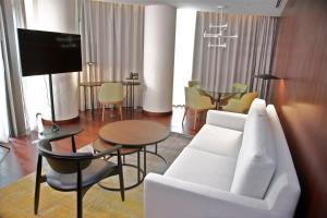TV a/nebo společenská místnost v ubytování Hotel Continental Horizonte