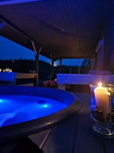 Φωτογραφία από το άλμπουμ του Dziki zakątek Piskornia dom z balią jacuzzi σε Piskornia