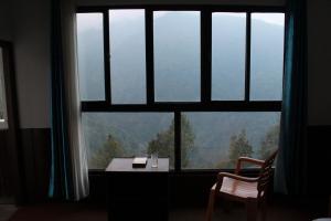 Fotografie z fotogalerie ubytování Silent wood retreat Phadamchen v destinaci Padamchen