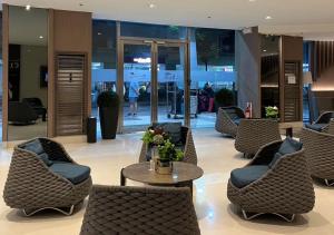 Et opholdsområde på Victoria Suite at Shore Residences