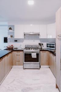 Kuchyň nebo kuchyňský kout v ubytování Torre Prisma Rd Apart C