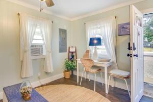 a home office with a desk and a window at Chincoteague Apartment with Deck Walk to Waterfront in Chincoteague