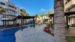 Bazén v ubytování Bonito Departamento cerca de las Playas del Puerto de Mazatlán. nebo v jeho okolí + 4 fotografie