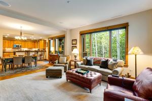 a living room with a couch and a table at Always Arrowhead in Edwards
