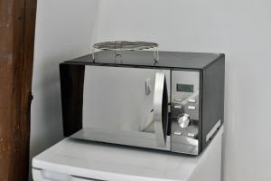 Nhà bếp/bếp nhỏ tại La Domus Lemaitre 8 - formule éco -parking - WIFI - autoroute