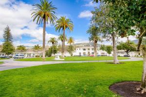 a park with palm trees and a building at Silverado Resort and Spa 381 & 382 in Napa