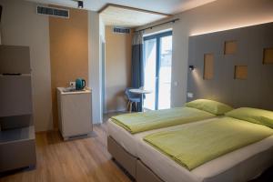 Postel nebo postele na pokoji v ubytování Balibà Ride & Relax