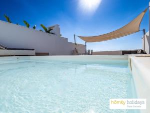 Baseinas apgyvendinimo įstaigoje Homity Exclusive Playa Granada Beach & Golf - Mar de Astrid arba netoliese