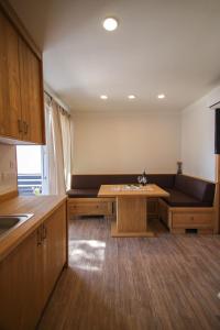 Η κουζίνα ή μικρή κουζίνα στο Apartments Erica Lux