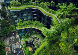 een uitzicht op een gebouw met bomen erop bij Sunny 1BR / 1Bath apartment in Singapore! in Singapore