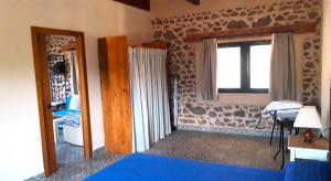 Postel nebo postele na pokoji v ubytování Ecoturismo Cabo Tiñoso