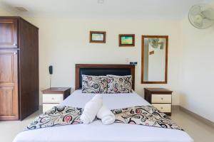 Letto o letti in una camera di Hotel Verony Guatape